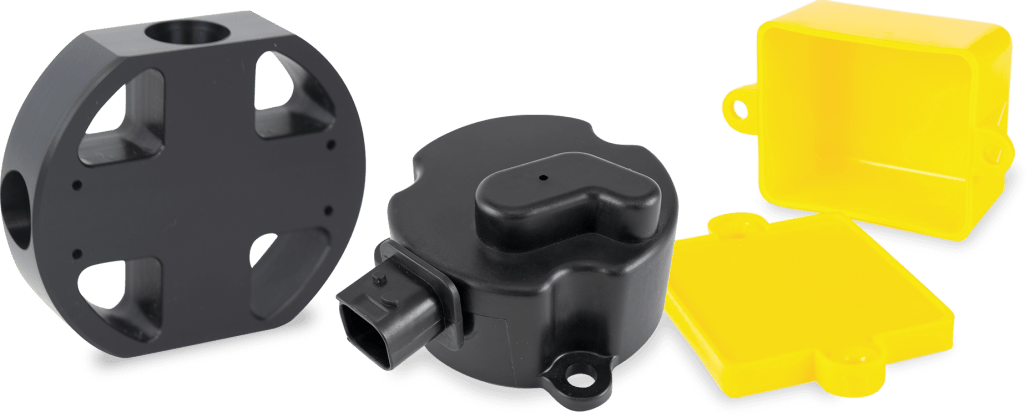 machined delrin parts from jaco, yellow and black